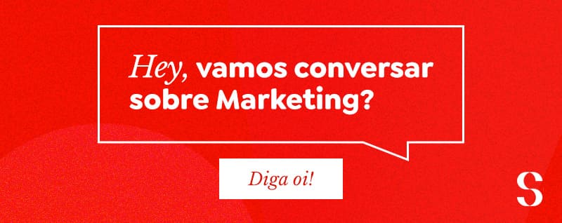 Imagem vermelha com uma caixa de diálogo escrito "Hey, vamos conversar sobre Marketing? Diga oi"